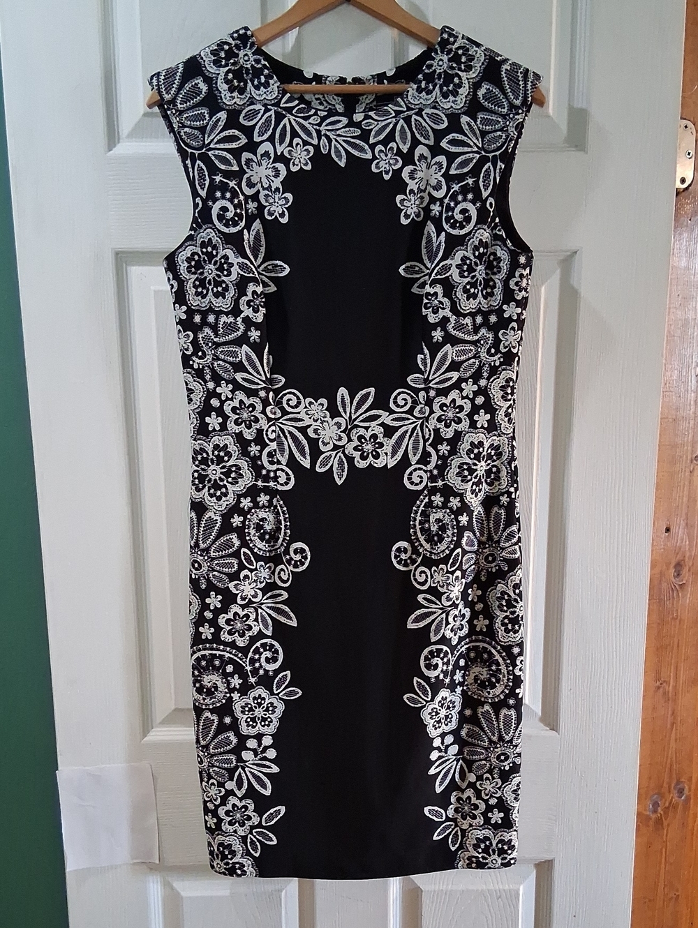 Classic Black Sheath Dress with White Floral Design